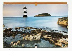 Buy Framed Lighthouse Picture & Grassy Island With Coastal Rockpools In Foreground • 1.99£